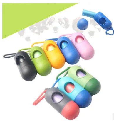 Compact black dog poop bag dispenser with side hook and Velcro strap, shown next to a roll of waste bags.