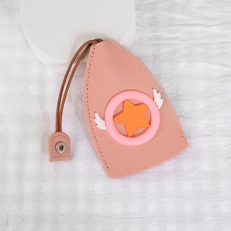 Cartoon patterned pull-out car key case made from PU leather, showing the open design.