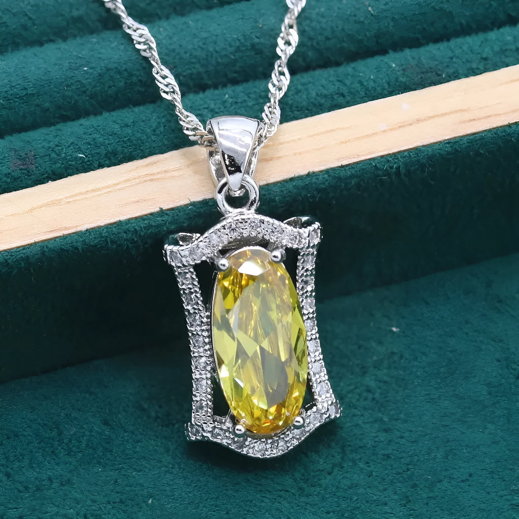 Women's zircon jewellery set with necklace, earrings, ring and bracelet in yellow or olive colour