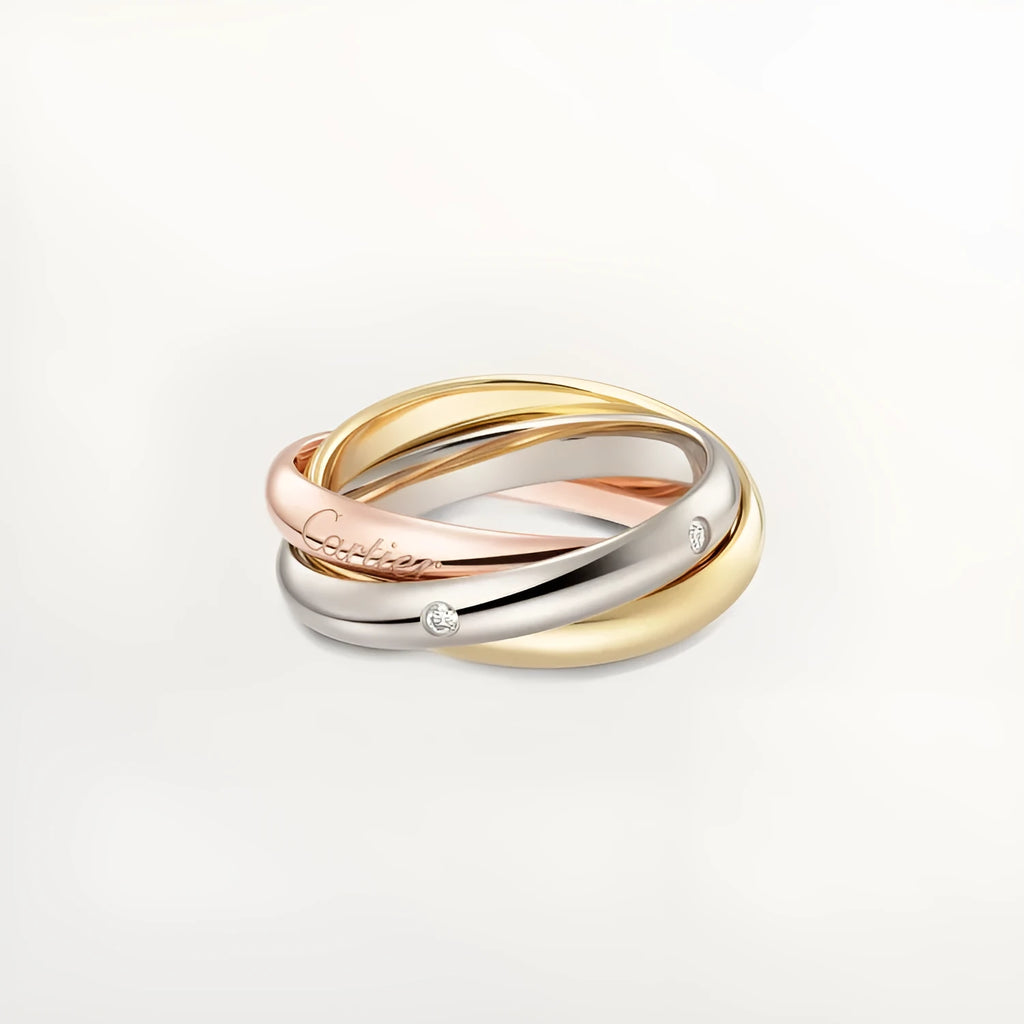 Three stackable geometric U-shaped sterling silver couple rings on a finger, showing gold rose silver finish.