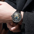 Men's mechanical watch with stainless steel strap, round dial, and transparent case back showing movement