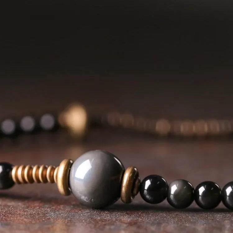 Geometric black stone beaded bracelet with multi-layered retro design
