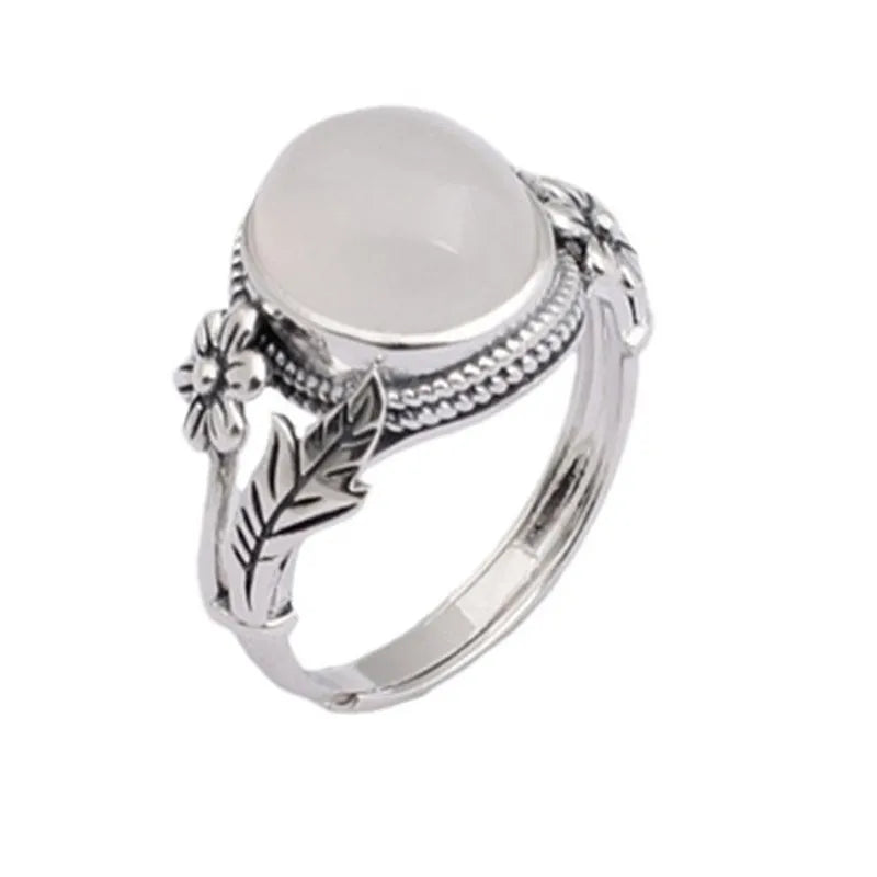 Adjustable copper vintage ring with white chalcedony stone and open mouth design