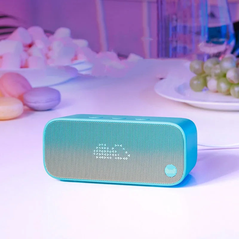 Artificial intelligence smart WiFi speaker in blue colour with bookshelf design and front-facing speakers