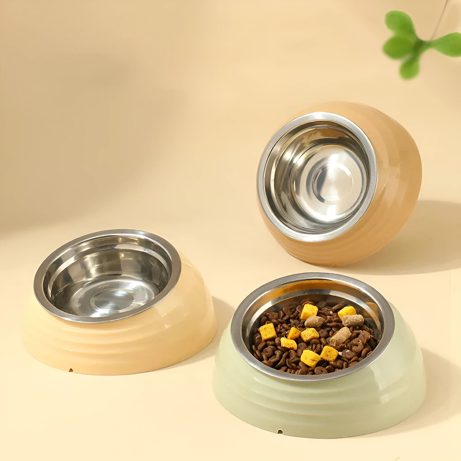 Plastic cat bowl feeder in beige, brown, or light green colour options.