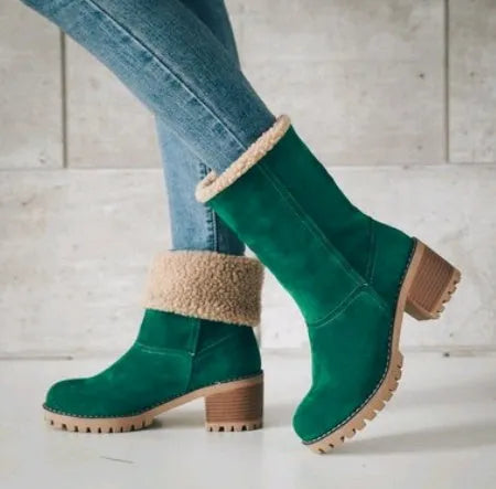 Women's mid-calf suede snow boots in black with a thick flat heel and round toe.