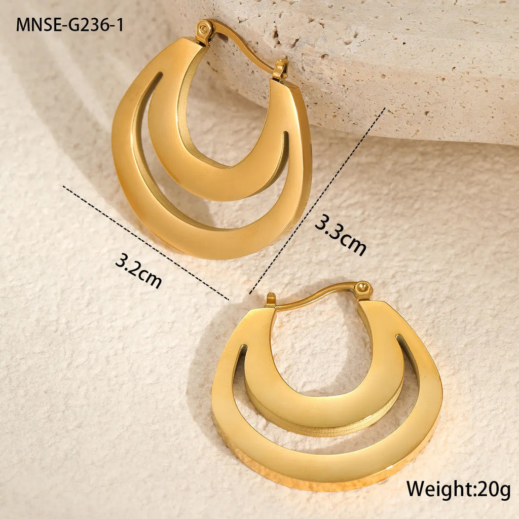 Geometric gold plated French earrings with round ring elements on stainless steel