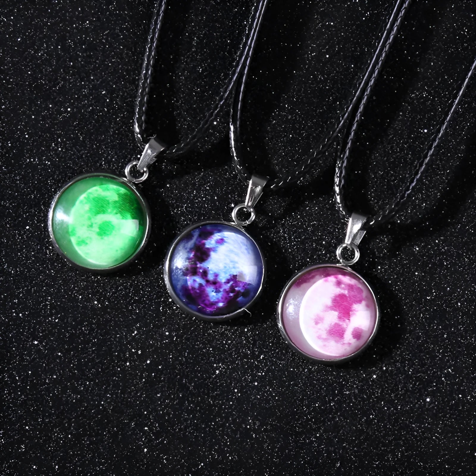 Close-up of a luminous constellation model glass pendant on an alloy necklace chain with extension.