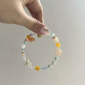 Mixed material alloy bracelet with diamond shape links and round detailing in colour Bracelet 0213
