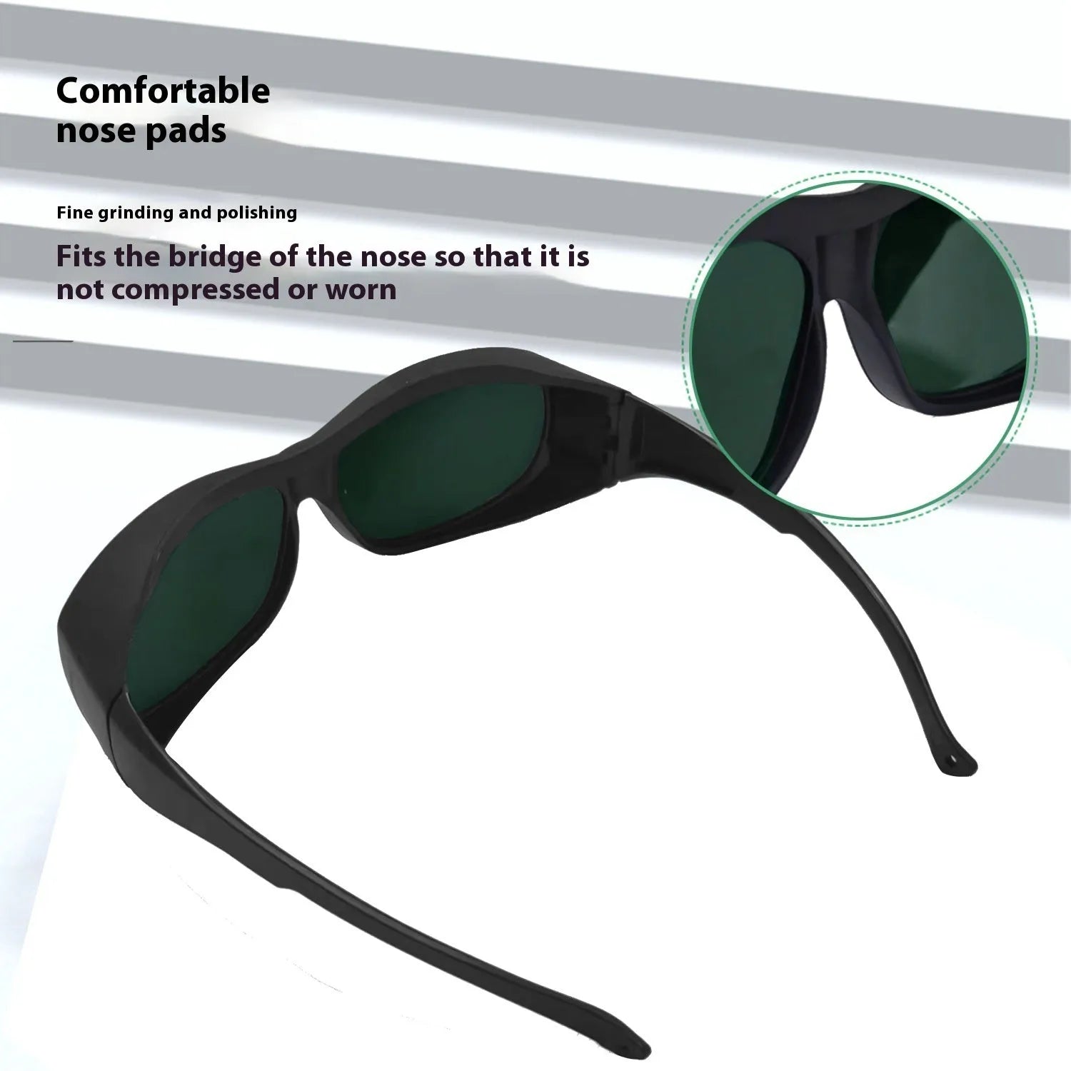 Pair of clear laser safety goggles for 200-2000nm protection with a cleaning cloth.