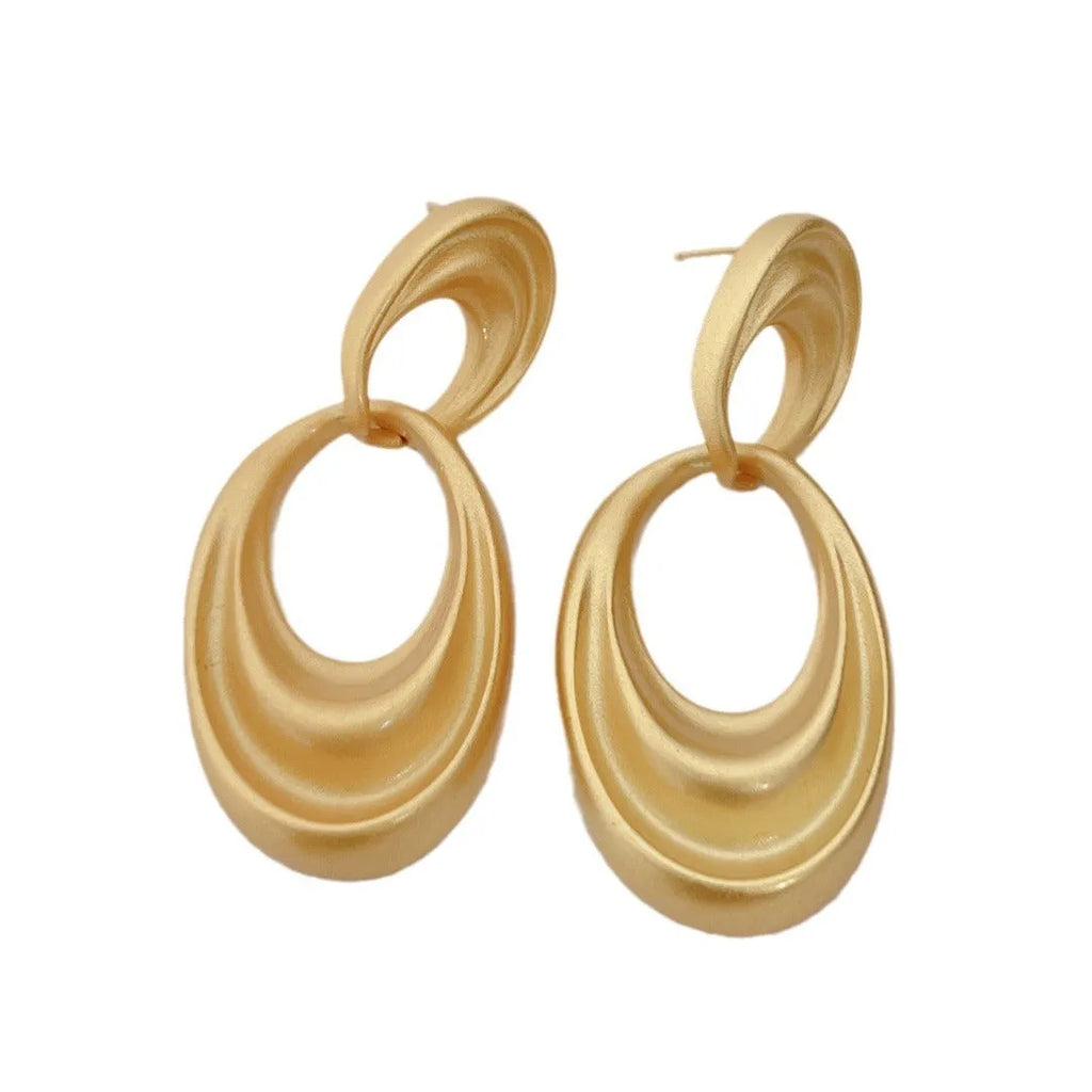 Women's double circle earrings in quicksand colour with French retro styling and copper construction