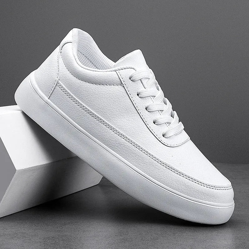 Women's gold leather lace-up casual flat shoes on a white background, showing front and side views.