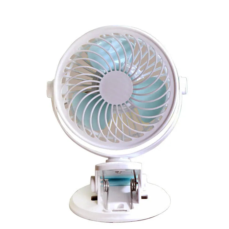 Small USB-powered desk fan shown in clip-on and floor-standing styles on a wooden desk.