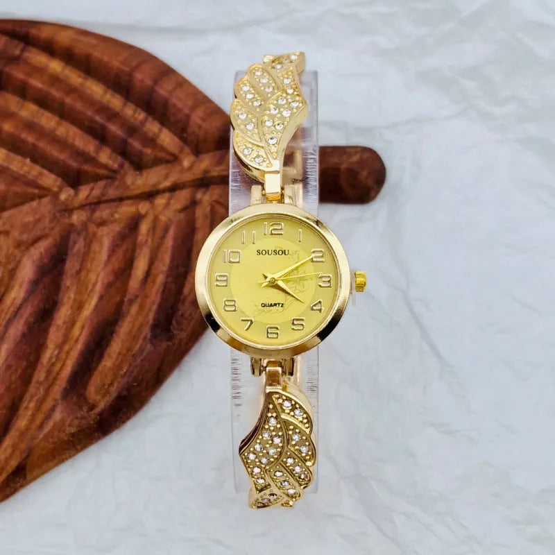Women's stainless steel watch with round dial and Vachette clasp, shown in gold colour option.