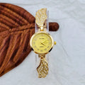 Women's stainless steel watch with round dial and Vachette clasp, shown in gold colour option.
