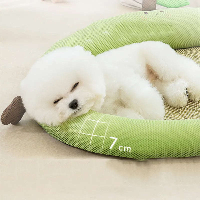 Green fruit backrest pet cushion bed for a dog, showing its nest-like shape and soft mat base.