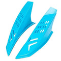 A pair of coloured decorative horn attachments for a child's motorbike or ski helmet.