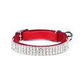 A soft red velvet cat collar adjustable between 20 and 30 cm in length.