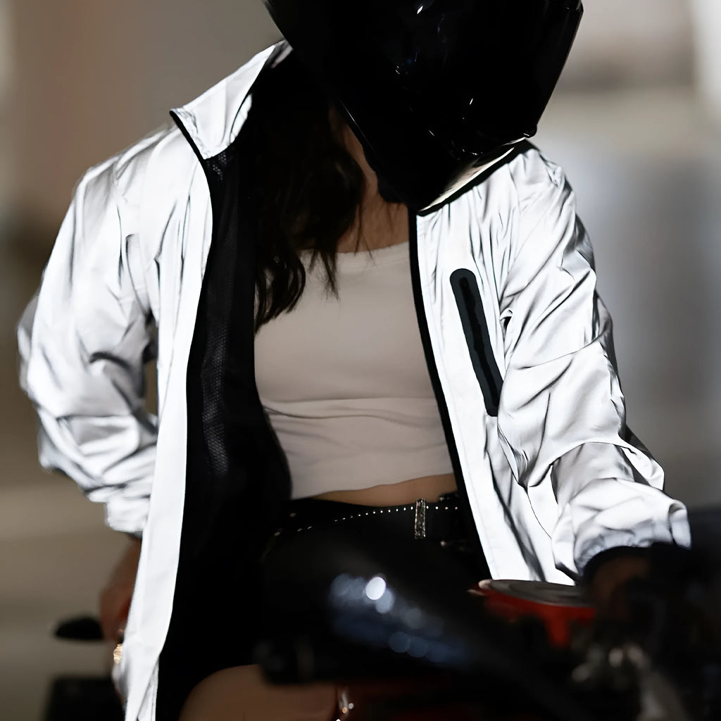 Silver waterproof polyester long sleeved coat on a hanger, showing front design.