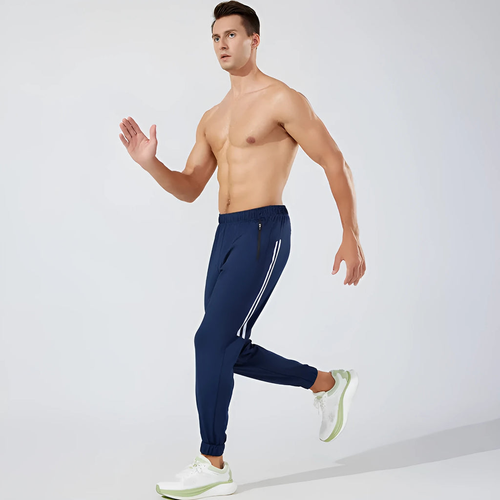 Men's black running trousers with mid waist design and standard length made from breathable polyester fabric
