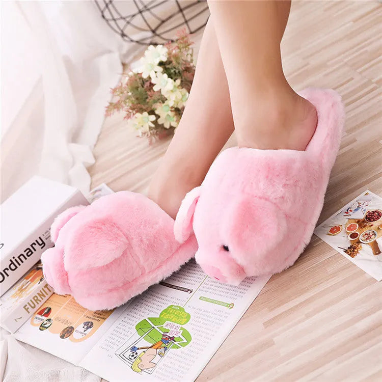 Pink adult pig floor slippers with short plush fabric and PP cotton filling.