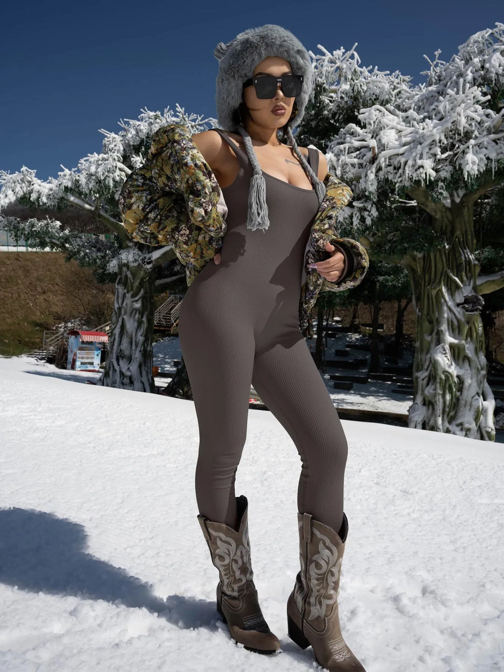 Women's long sleeve spandex suspender tank top tights with a button detail waistband.