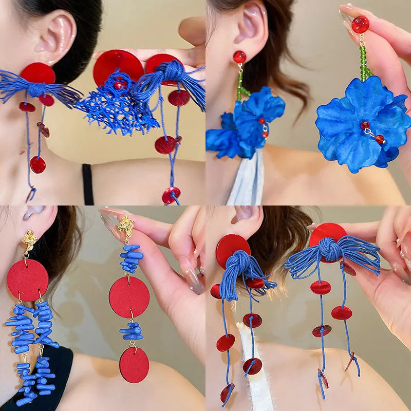Geometric women's earrings with cloth construction, silver needle and blue resin flower accents