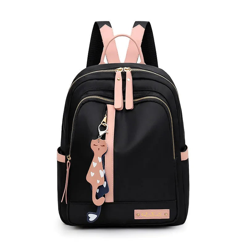 Women's nylon casual backpack in black with double shoulder straps and front pocket