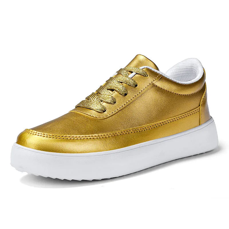 Women's gold leather lace-up casual flat shoes on a white background, showing front and side views.