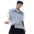Man wearing a loose-fit gradient blue short-sleeved polyester casual shirt.
