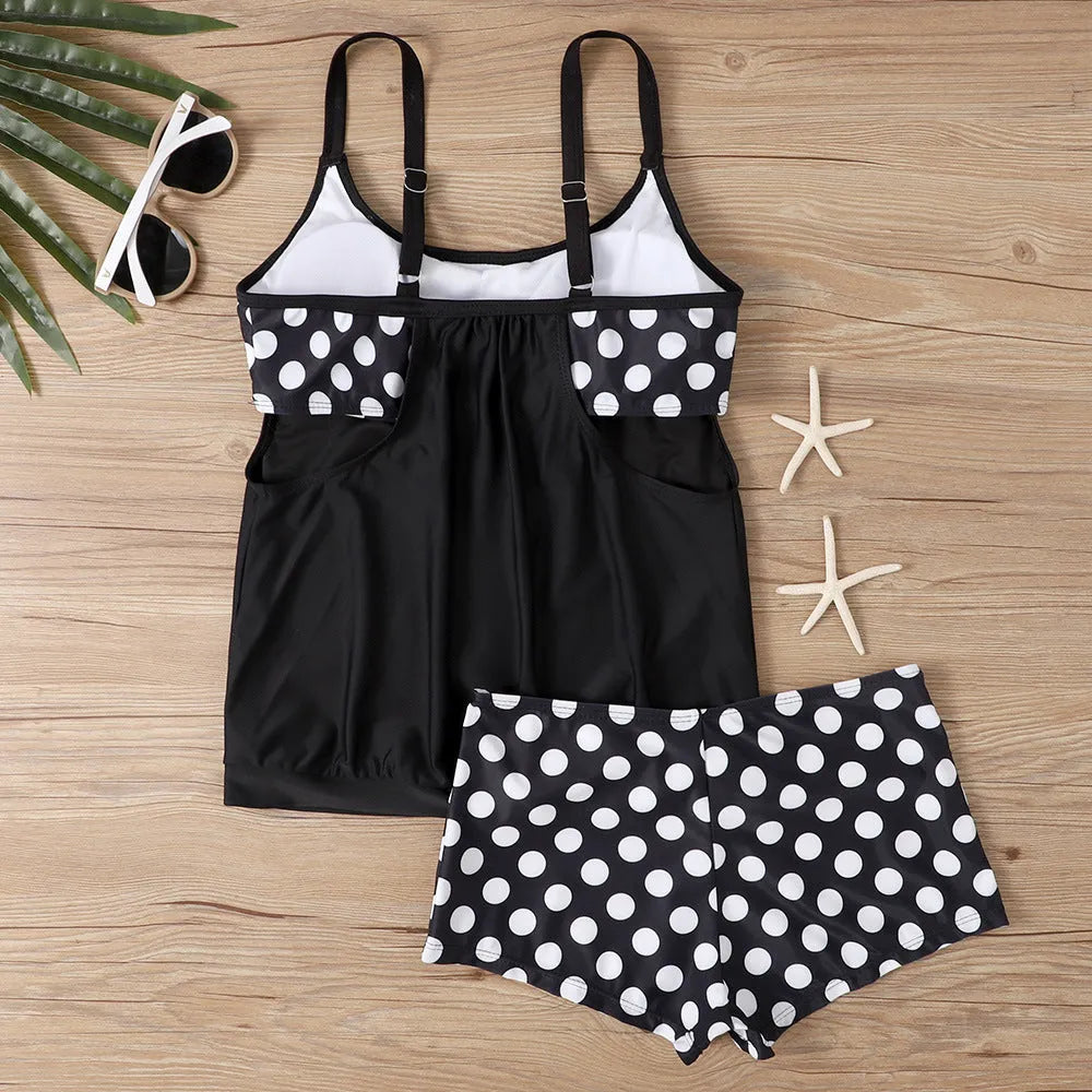 Women's high-waist polka dot boxer swimsuit briefs in polyester fabric on a mannequin.