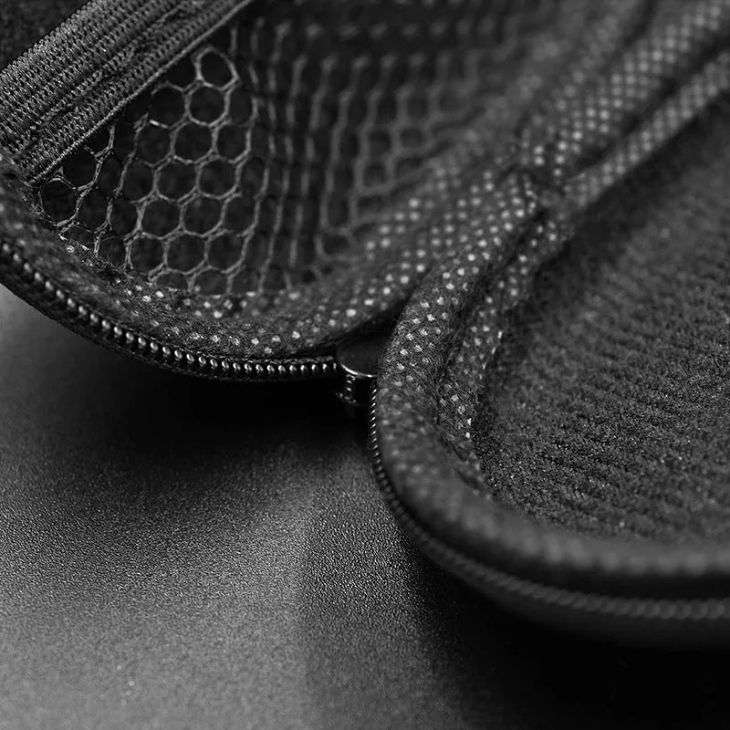 Black leather oval-shaped earphone storage case for EDX PRO and similar models.