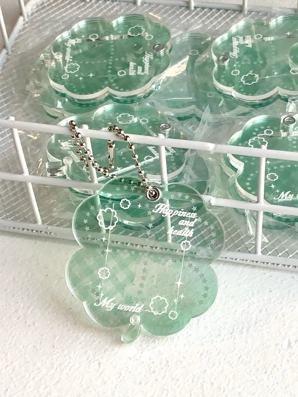 Acrylic four-leaf clover phone pendant keychain in blue, green and mint colours