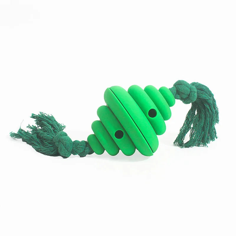 Green and yellow oval dog ball with knotted rope, a slow-leak food dispenser chew toy.