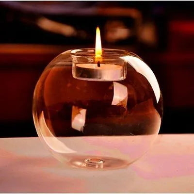 Clear round handmade hollow glass candle holder in three size options
