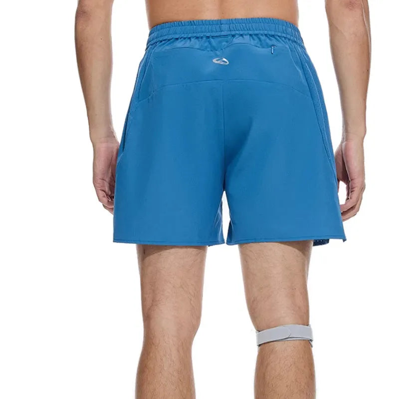 Black and blue four-point running shorts with laser stitching on stretch fabric.