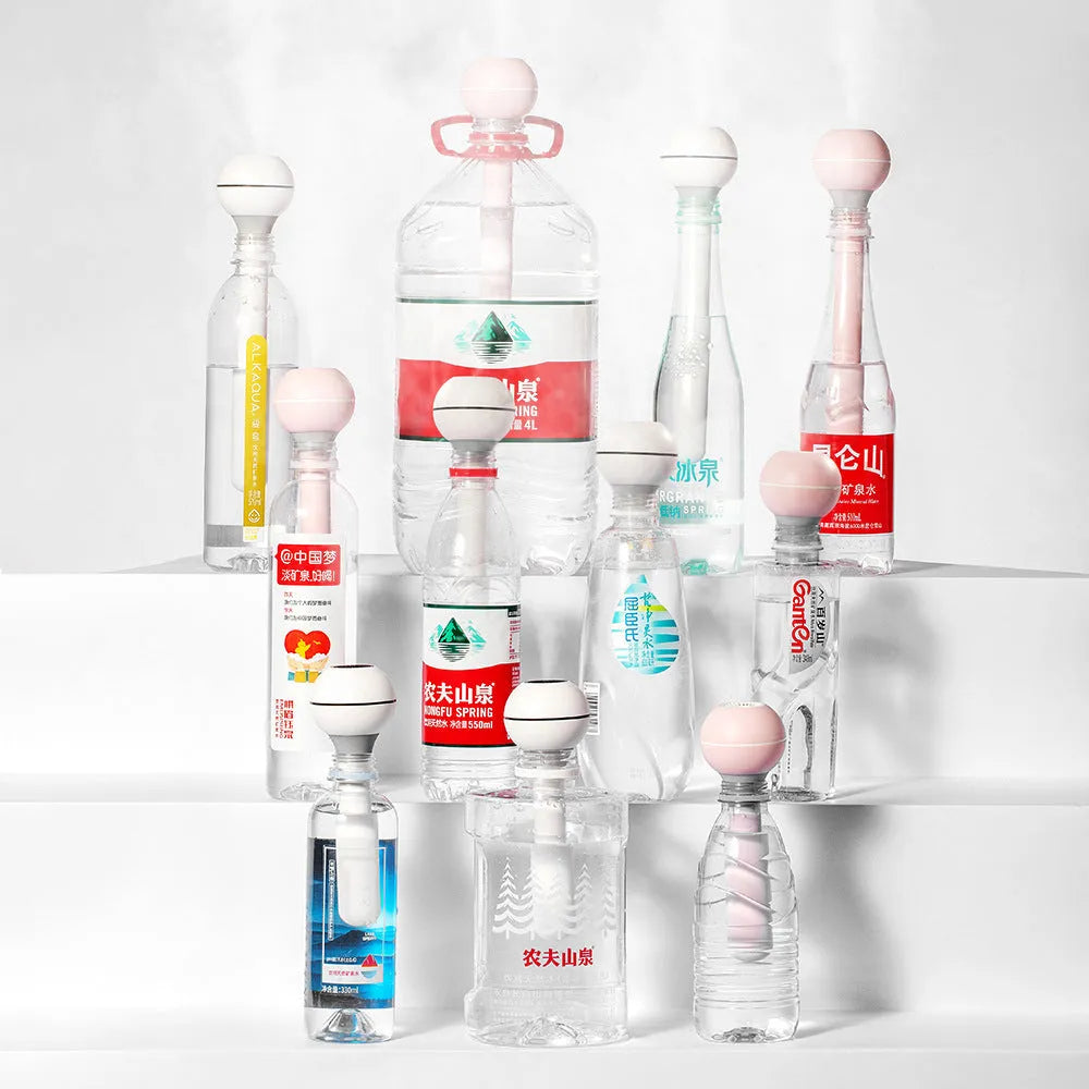 Pink and white columnar USB desktop humidifier with 1 litre water tank