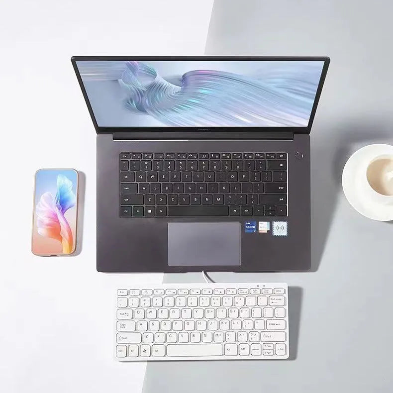 USB wired mini keyboard in black, white, pink or blue with 280x125mm dimensions