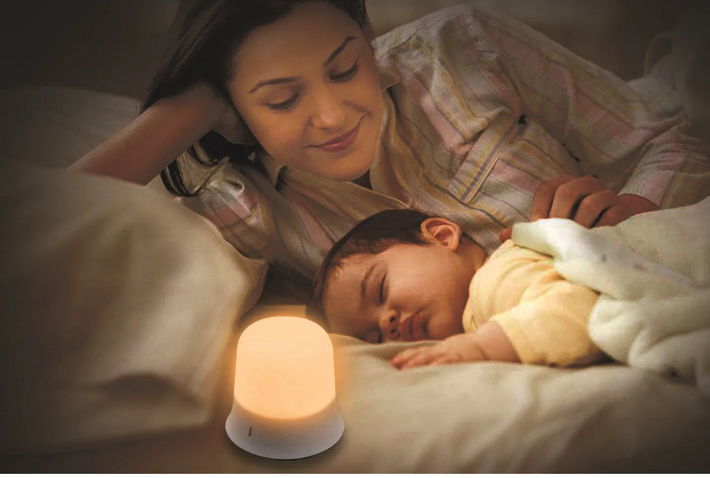 White bedside nursing night light with touch controls showing dimming and colour options