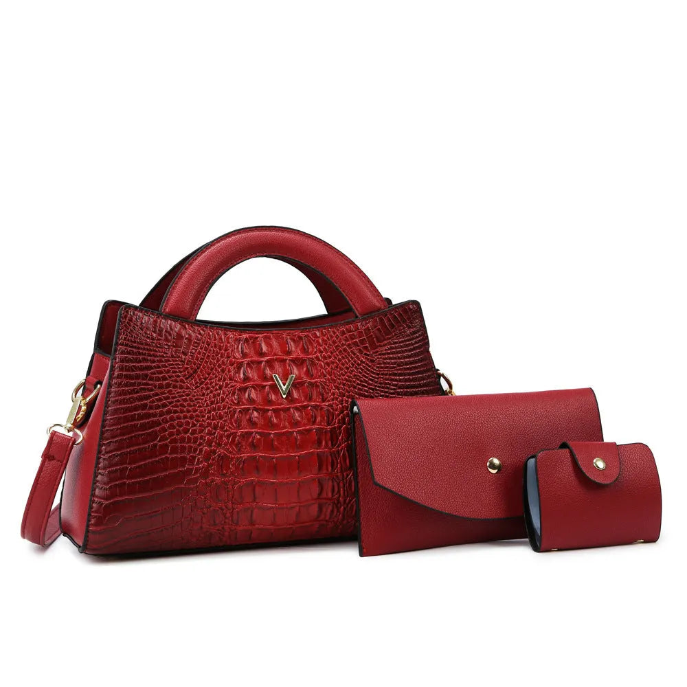 Women's black crocodile pattern PU leather crossbody shoulder bag with internal pockets.