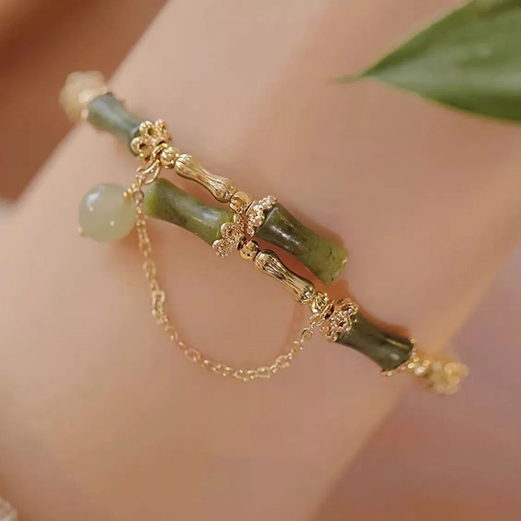 Women's plum wine coloured bamboo joint beaded bracelet with a glossy glaze finish.