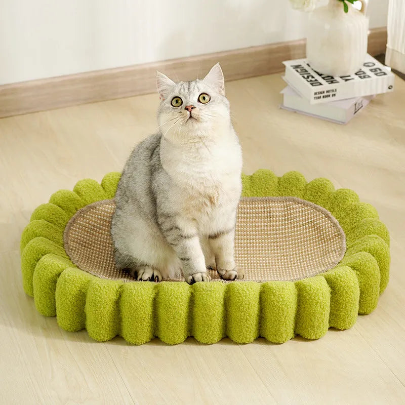 Green oval cat scratch pad bowl with sisal scratching surface measuring 650mm