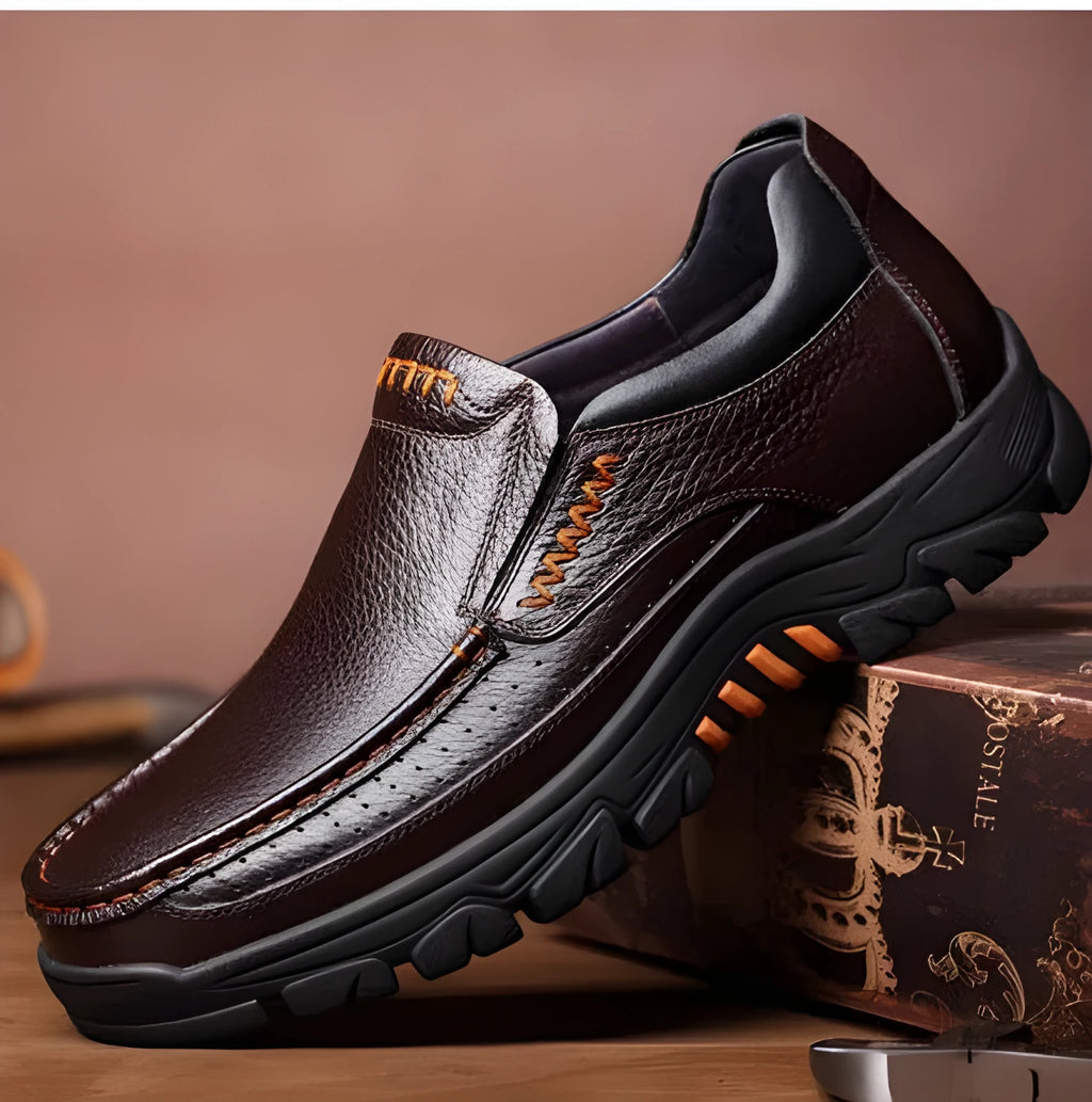 Men's black leather slip-on business casual shoes with a rubber sole.