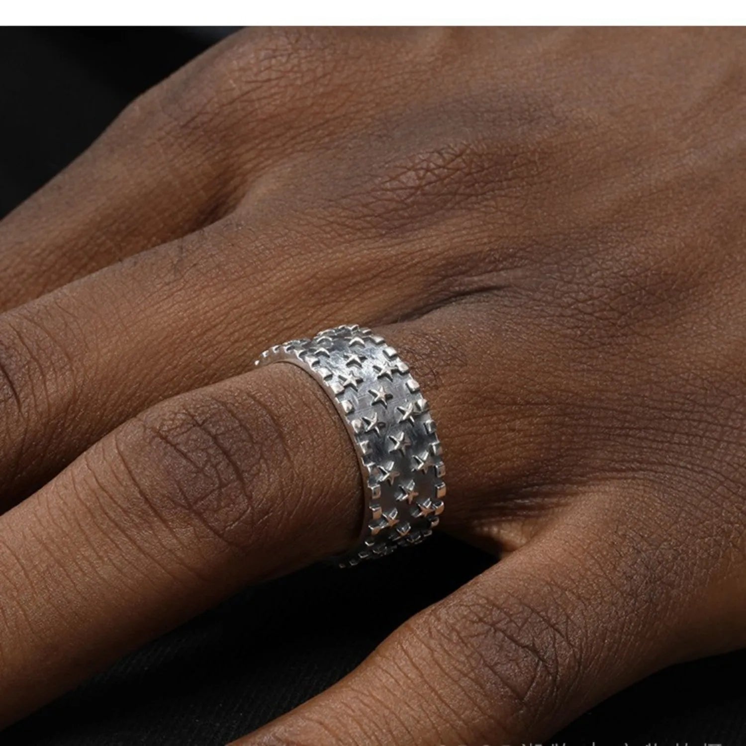 Adjustable pure silver ring with a geometric multi five-pointed star design on a silver band