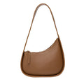 Small genuine cowhide leather half moon handbag with a wide shoulder strap.