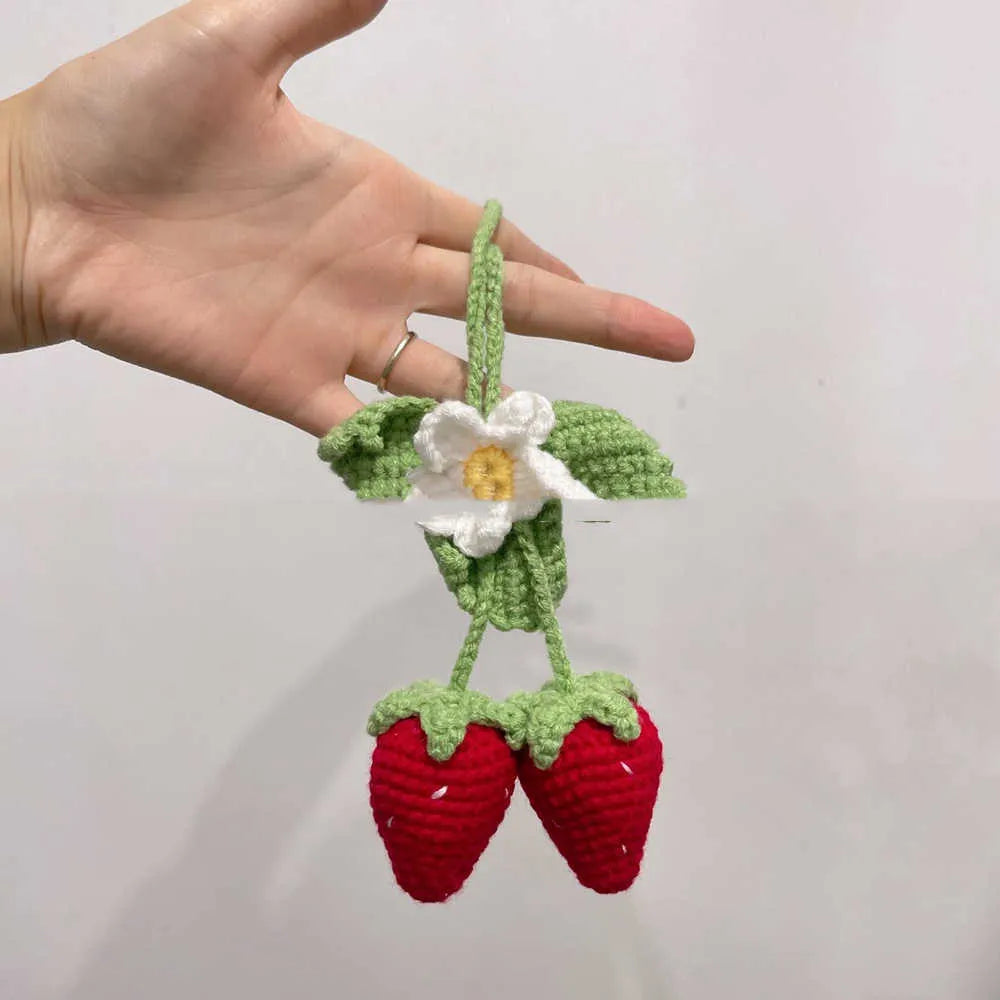 Handmade strawberry car pendant decoration with traditional hook knitting using cotton and hemp materials