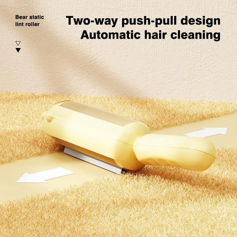 Blue reusable pet hair remover tool with a roller and self-cleaning base.