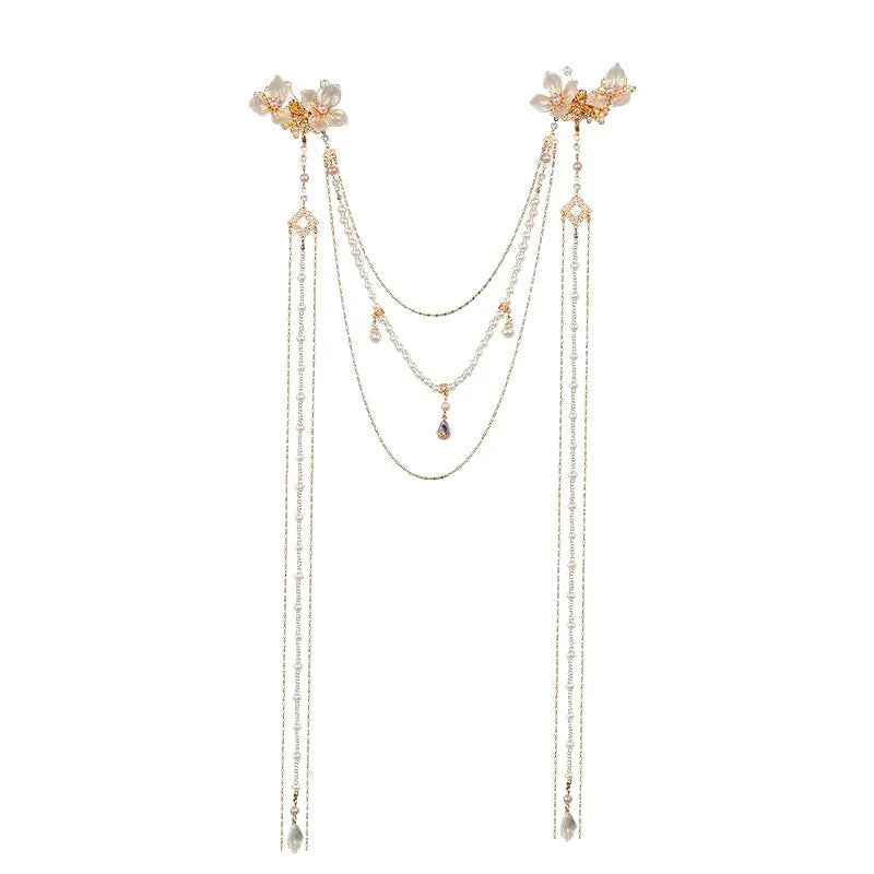 Gold women's hairpin with pearl diamond flower decoration and long acrylic tassel.