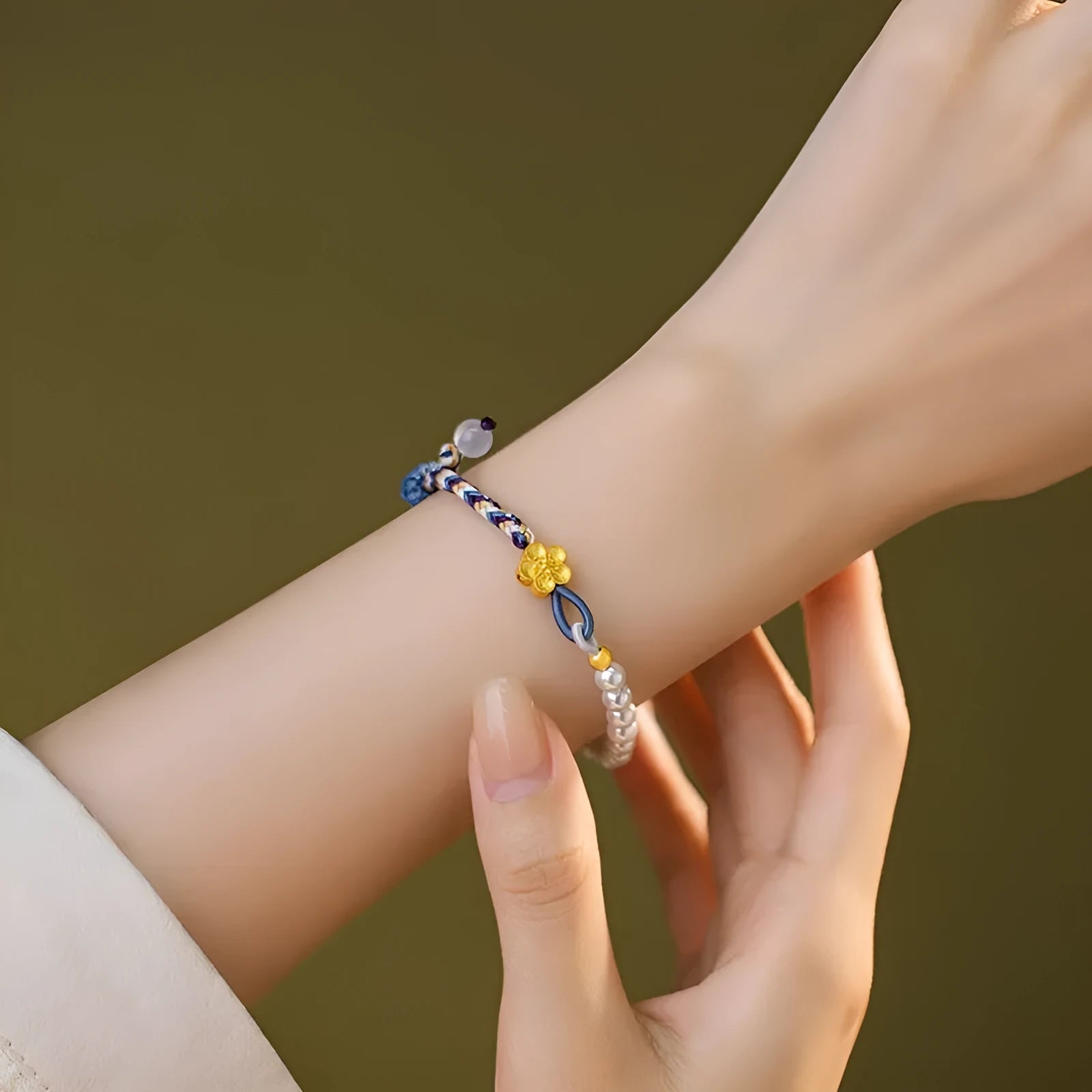 Peach-coloured Chinese flower weaving carrying strap with pearl accents on cord material
