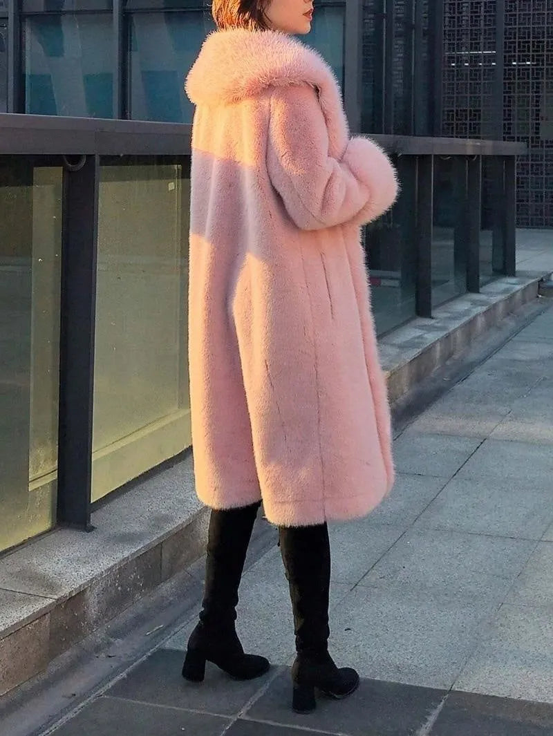 A gray women's mid-length coat with thick faux rabbit fur, leather panels, and a faux fur collar.